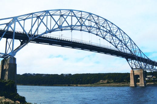 Photo of the Sagamore Bridge. Adapted from "Sagamore Bridge, Sagamore MA" by John Phelan, used under CC BY 3.0.