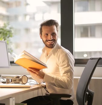 photo-of-man-holding-a-book-927022 photo-of-man-holding-a-book-927022