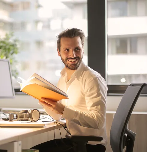 photo-of-man-holding-a-book-927022 photo-of-man-holding-a-book-927022